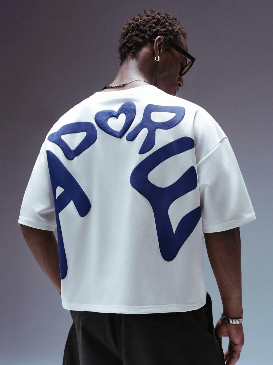 Oversized white tee with Adore print across the back
