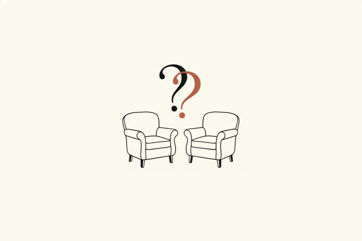 Line illustration: two armchairs facing each other with two question marks intertwined above them; one question mark is the terracotta accent.